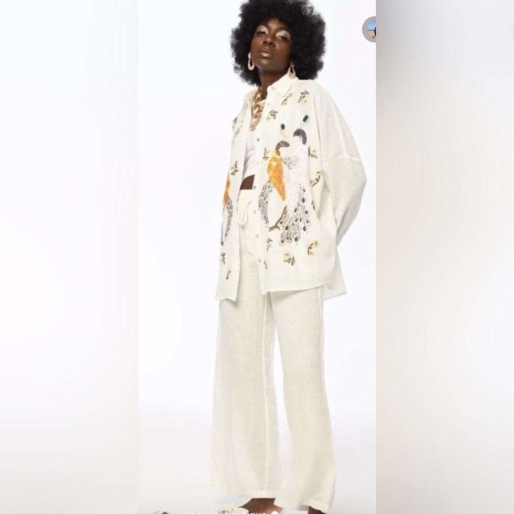 Classy and trendy Embroidered White top with a slip
On pants set - Picture 2 of 10